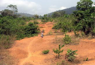 Woman carrying gravel in headpan