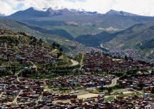 Large city in a valley surrounded by mountains