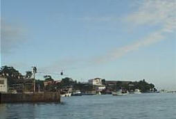 Harbor under blue sky with some boats