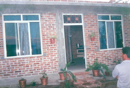 Front of a small, brick house